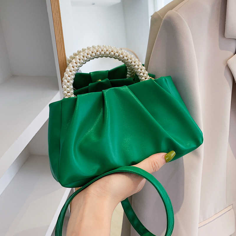 Solid women's bag 2022 summer new cloud bag fashion soft face portable bag simple foreign style single shoulder diagonal bag