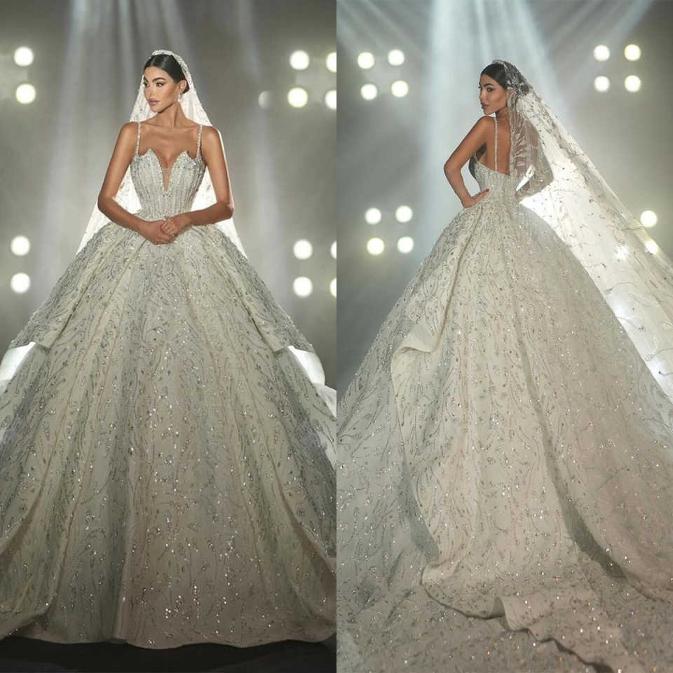 Luxury Ball Gown Wedding Dresses Bateau spaghetti strap Sleeveless Lace Net Appliqued Cathedral Bridal Gowns Elegant Arabian Dubai Custom Made Vestido