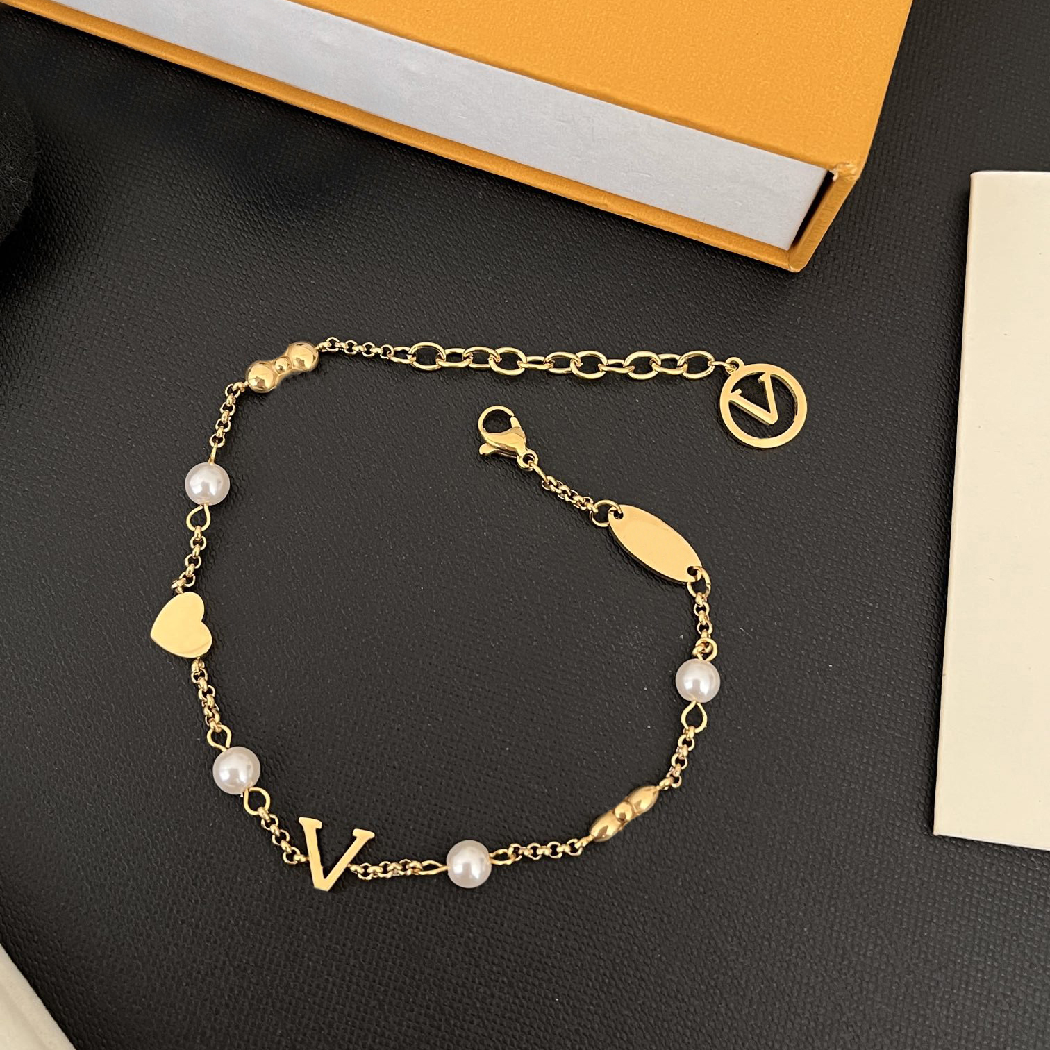 Gold Plated Charm Bracelet with Pearls and Heart - Delicate Beaded Bracelets for Women, Fashion Jewelry for Any Occasion.