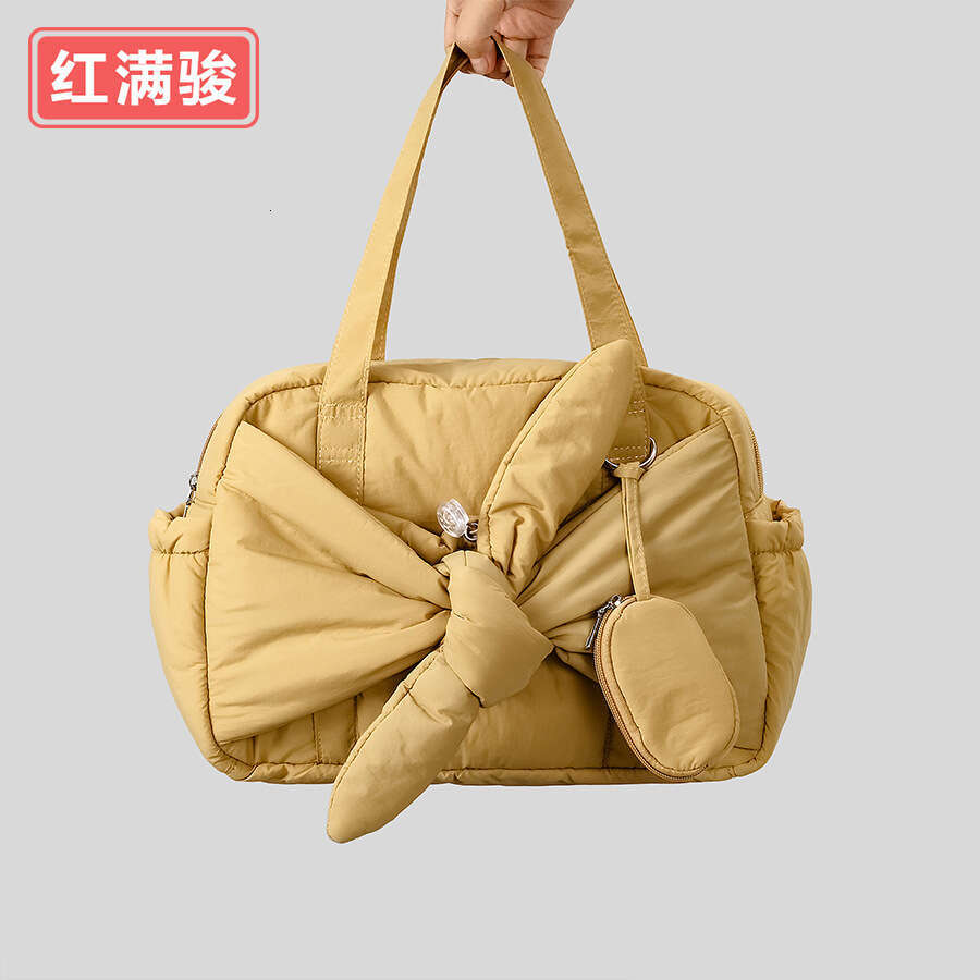 Autumn winter new niche design butterfly knot cotton filled handbag, fashionable and versatile square bag, women's lightweight armpit bag