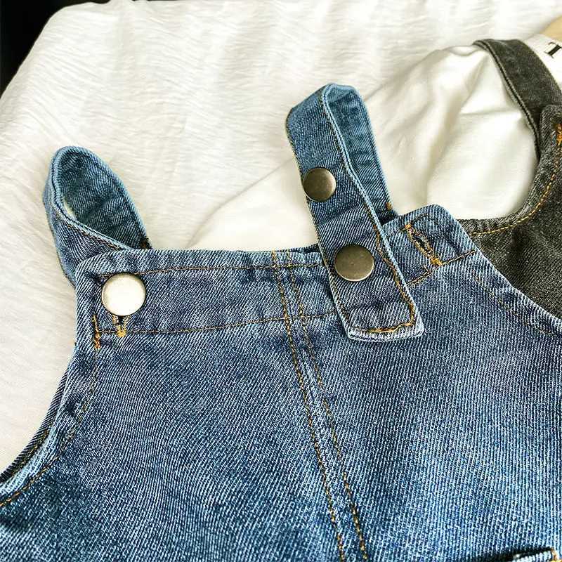 2023 New Korean Fashion Girls jumpsuit Solid Cowboy Pendant Cute Kaii Preschool Boys Jeans Pants Childrens Top W241227