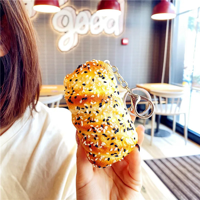 Creative simulation coconut bread keychain spoof gift decompression pinch fun bag charm personality accessories 241227