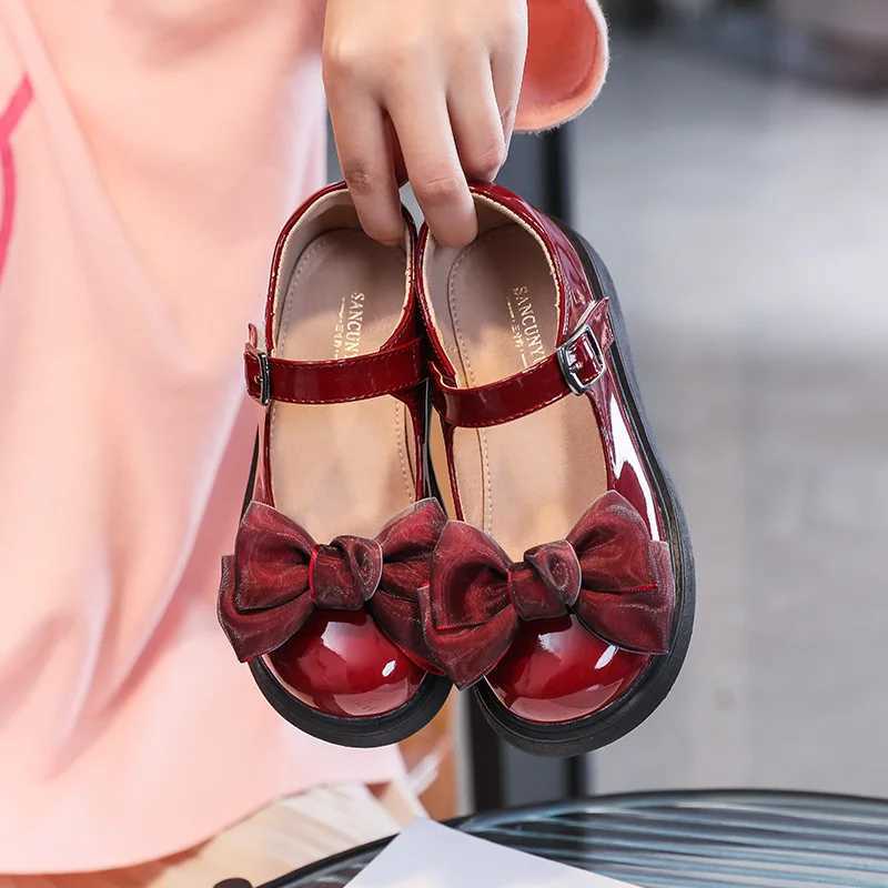 Girls leather shoes 2023 spring/summer new item childrens black soft soled princess bow British sled casual shoes W241228