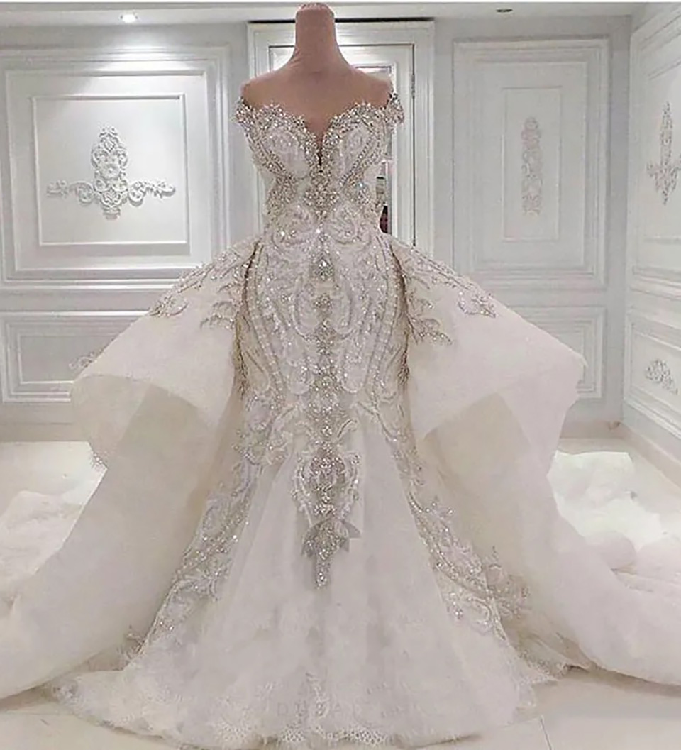 Customizable Plus Size Mermaid Bridal Gown Elegant Lace Detailing, Backless Cut, and Floor-Length Train