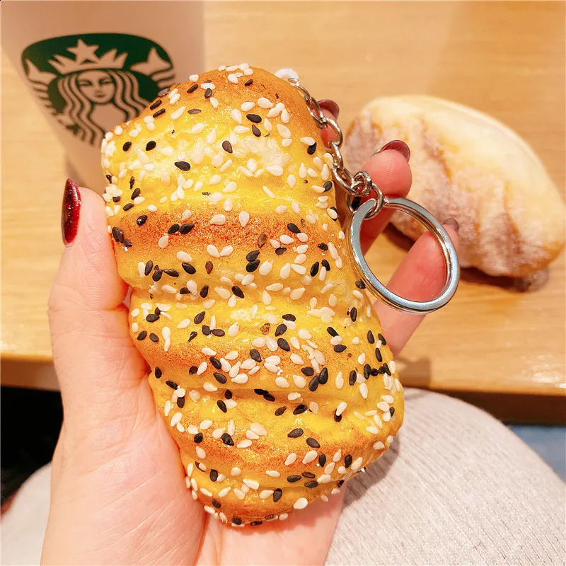 Creative simulation coconut bread keychain spoof gift decompression pinch fun bag charm personality accessories 241227