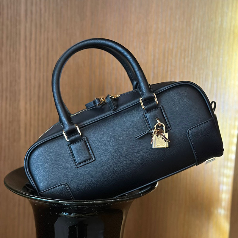 First-Layer Cowhide Boston Handbag 2025 New High-Quality Lock Pendant Pillow Genuine Leather Retro Shoulder Crossbody Bag