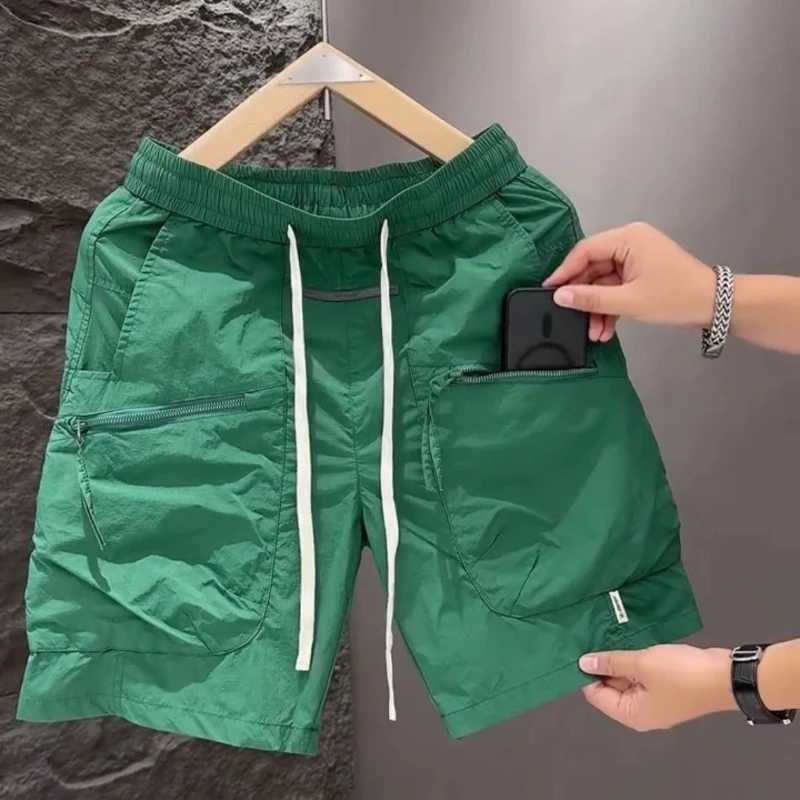 Summer thin mens pocket sized work clothes handsome street matching loose fast drying sports casual solid color shorts W241228