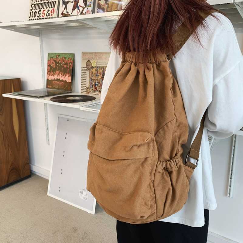 Bundle pocket backpack men's and women's large capacity travel sports bag solid color simple fitness bag wrinkled wash canvas bag 241230