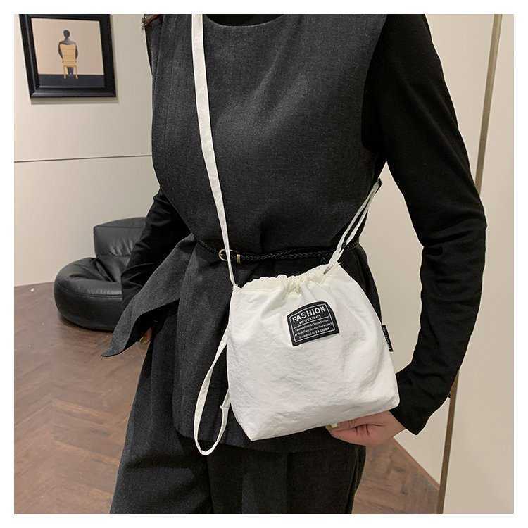 Japanese and Korean Artistic Single Shoulder Crossbody Bag Drawstring Small Bag Niche Solid Color Fashionable Lightweight Mini Phone Nylon Bag for Wom