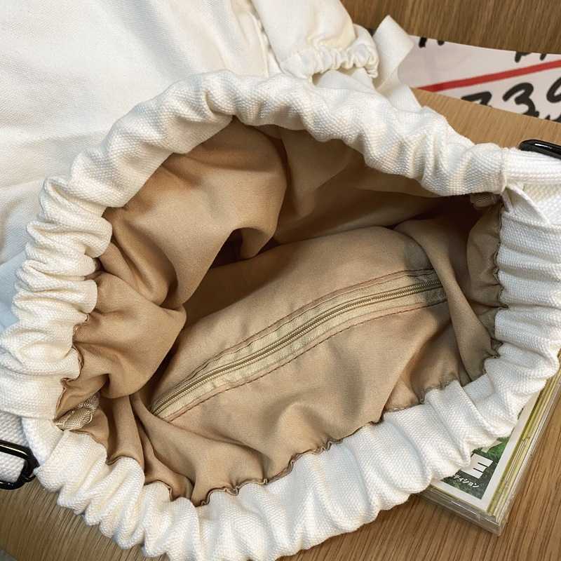 Bundle pocket backpack men's and women's large capacity travel sports bag solid color simple fitness bag wrinkled wash canvas bag 241230