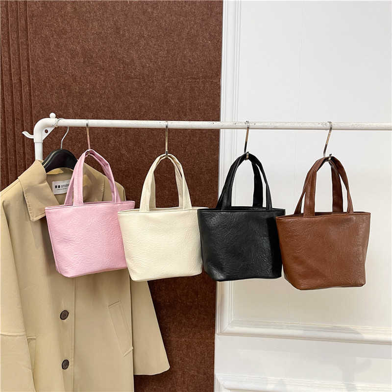 Fashion Solid Color 2024 Winter New Soft Surface Texture Large Capacity Casual Trendy Commuter Handheld Women's Bag 241230