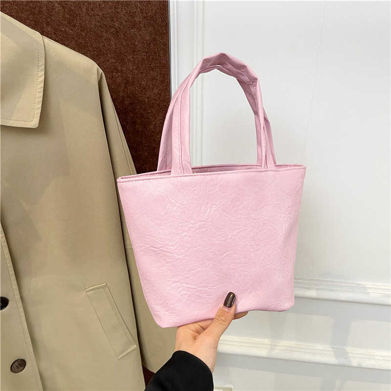 Fashion Solid Color 2024 Winter New Soft Surface Texture Large Capacity Casual Trendy Commuter Handheld Women's Bag 241230