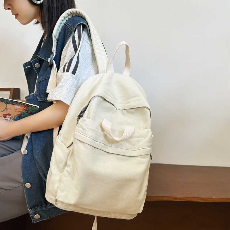 Washed canvas backpack for men and women, large capacity college student backpack for women, trendy brand street travel backpack 241230