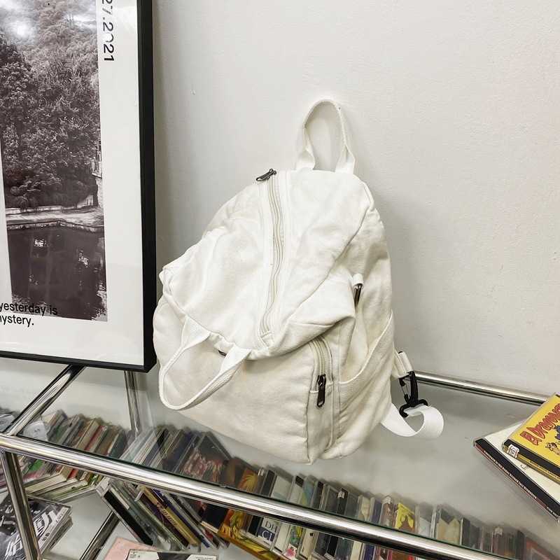 Washed Canvas Backpack men's and women's large capacity multipurpose Single Shoulder Messenger Bag lazy wind solid color small backpack 2412