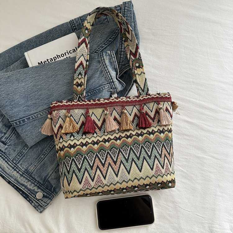 2024 New Fashion Women's Bag Ethnic Style Canvas Shoulder Bag Women's Large Capacity Tassel Striped Versatile Handbag