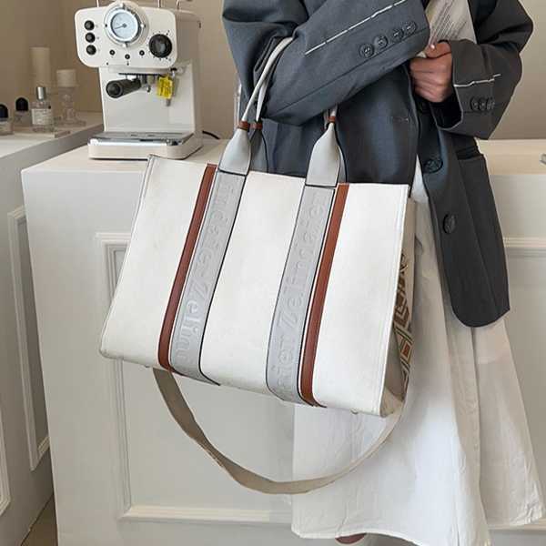 Female high-end niche tote bag contrasting color handbag large capacity commuting crossbody bag 241215