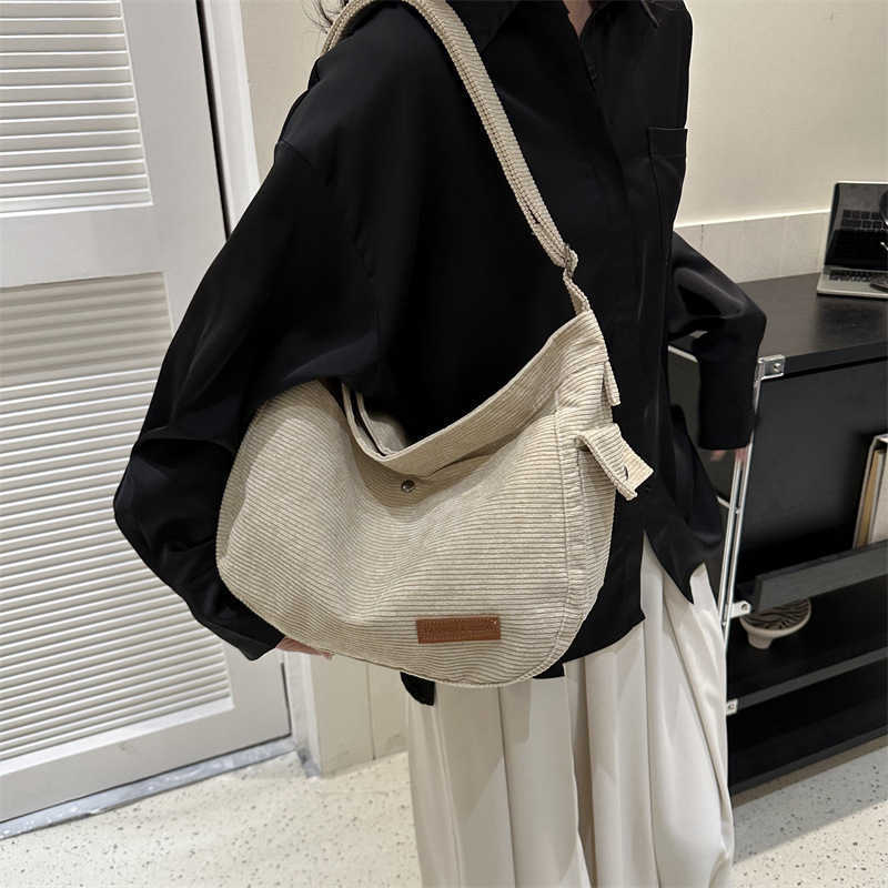 Large capacity canvas bag for women 2023 new casual trend single shoulder cloth bag solid color student class crossbody bag 241230
