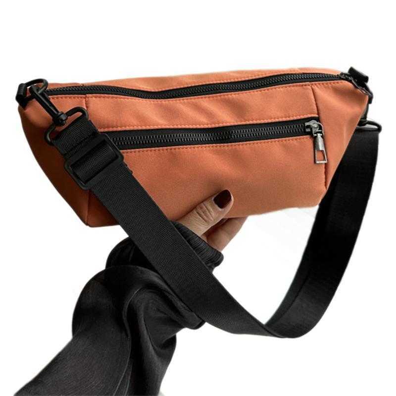 Trendy, casual, simple, lightweight, and stylish 2024 candy colored large capacity new diagonal small backpack sports shoulder bag 241230