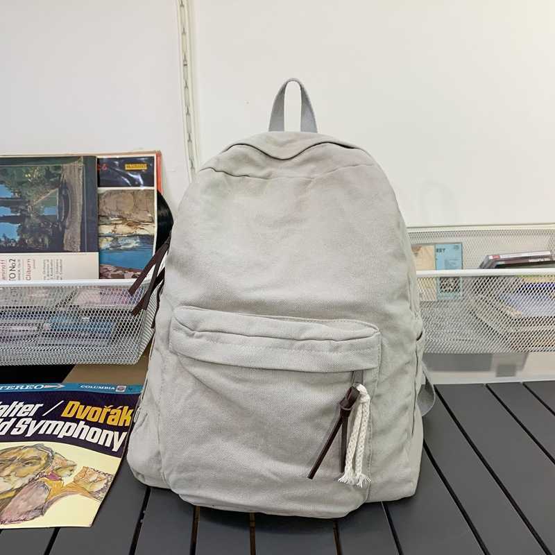 Korean version large capacity washed canvas backpack solid color backpack for male and female college students backpack travel backpack trend 241230