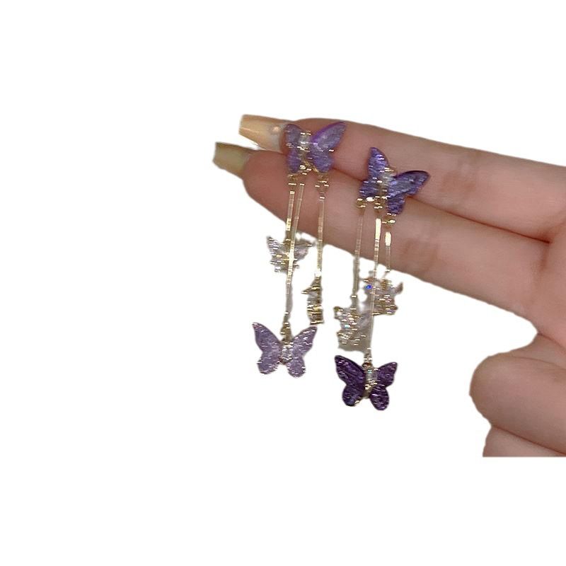 Charming Lavender Crystal Butterfly Dangle Earrings with Delicate Tassel Detail