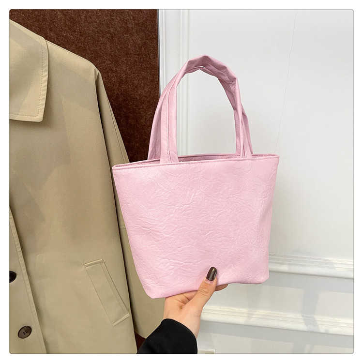 Fashion Solid Color 2024 Winter New Soft Surface Texture Large Capacity Casual Trendy Commuter Handheld Women's Bag 241230