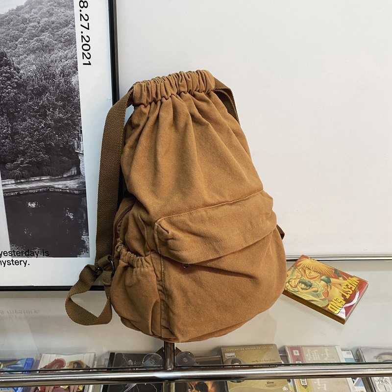 Bundle pocket backpack men's and women's large capacity travel sports bag solid color simple fitness bag wrinkled wash canvas bag 241230