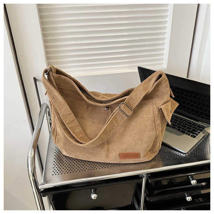 Large capacity canvas bag for women 2023 new casual trend single shoulder cloth bag solid color student class crossbody bag 241230