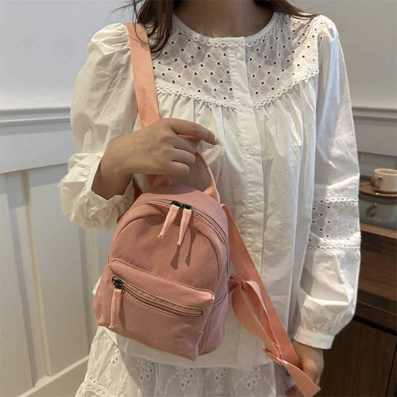 Nylon fabric casual 2024 new Korean version solid color travel simple backpack couple large capacity fashionable small backpack for women 241230