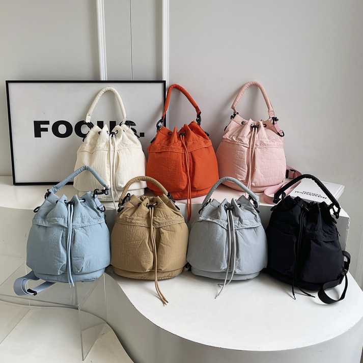Waterproof and lightweight cross shoulder crossbody bag, fashionable casual, large capacity drawstring bucket bag casual women's bag 241215