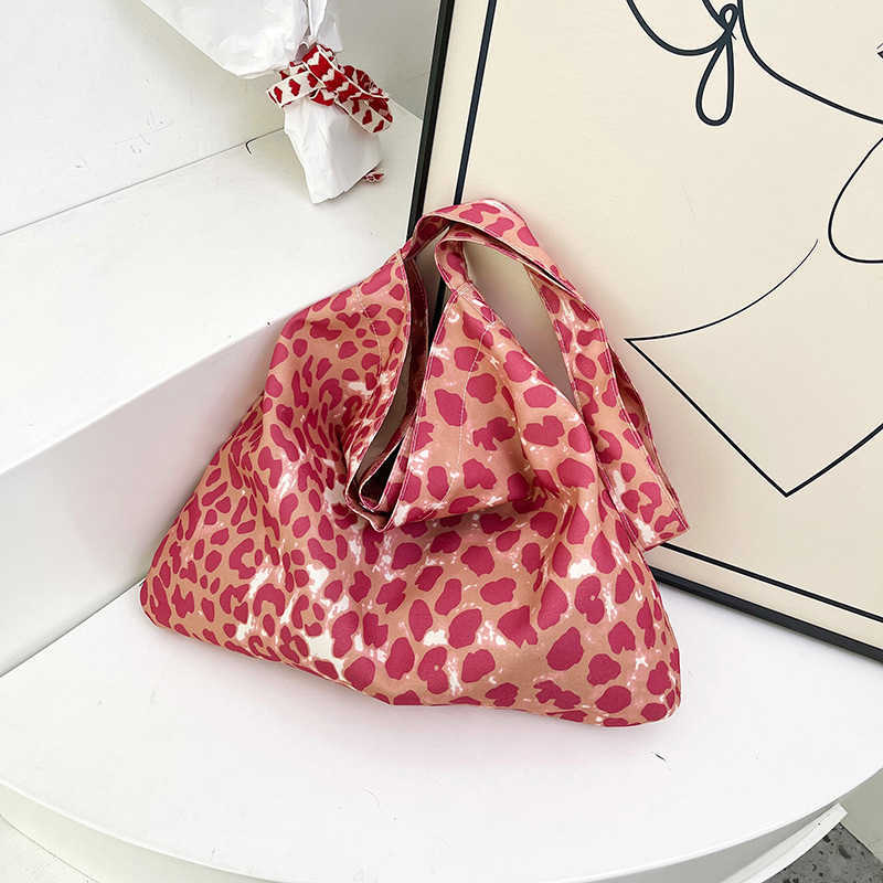Large capacity casual and stylish leopard print personalized lazy style shopping bag, fashionable canvas single shoulder diagonal cross bag for women