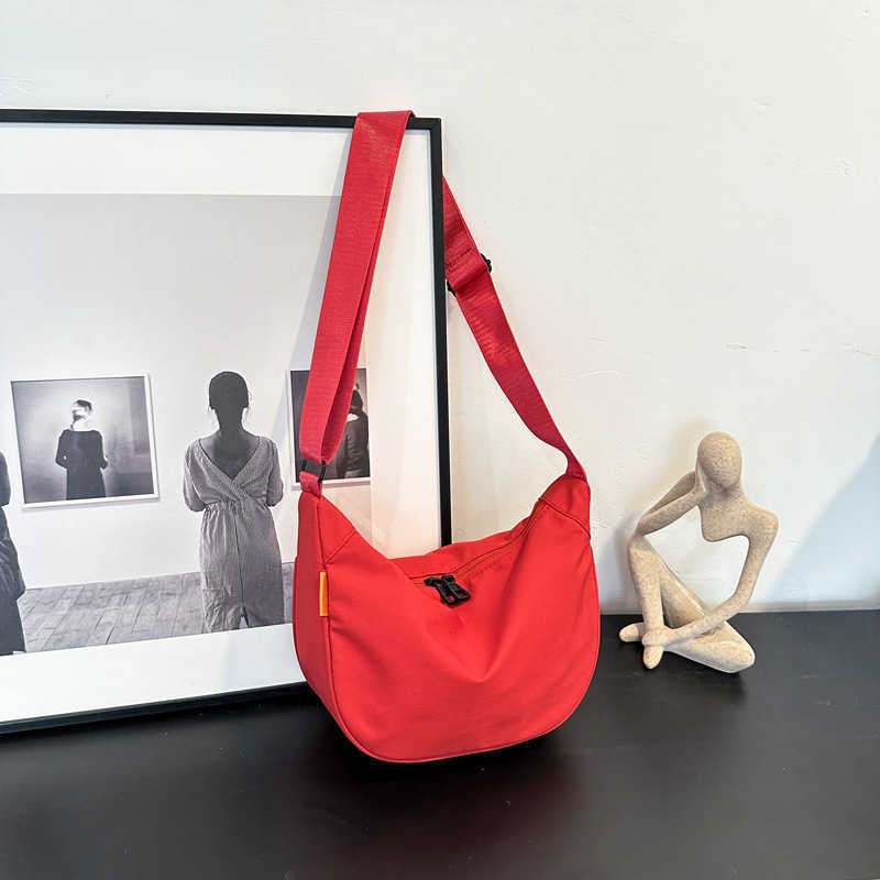 New large capacity simple and stylish 2024 nylon casual solid color contrasting dumpling tote single shoulder diagonal cross bag for women