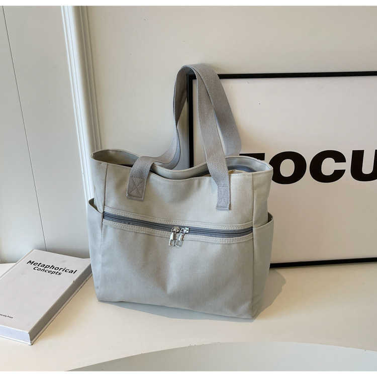 Canvas 2024 Spring Trendy Fashion New Large Capacity Multi functional Shopping Bag Simple Single Shoulder Handheld Women's Bag 241231