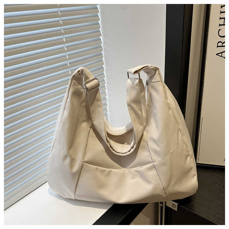 Korean style large capacity canvas lazy style commuting casual pleated work ins minimalist underarm tote single shoulder women's bag 241231