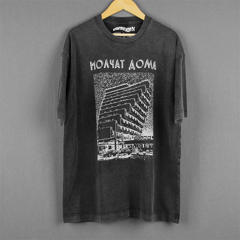 Molchat Doma Etazhi, member of the dark wave band, is a cotton washed long short sleeved T-shirt