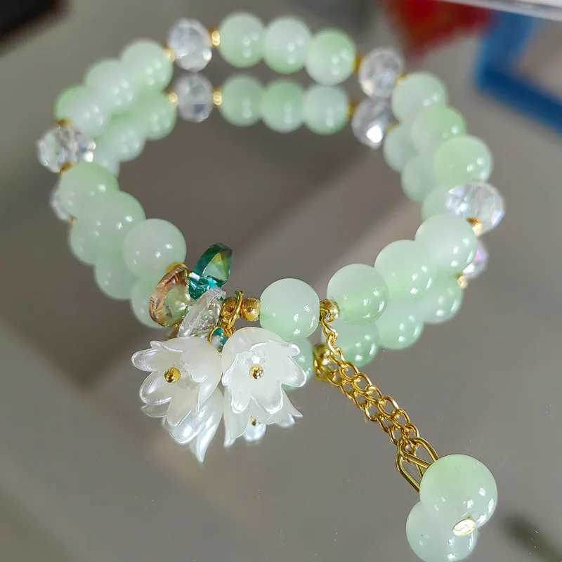 Cute green crystal bead bracelet suitable for womens Tren Lily Valley floral charm elastic adjustable bracelet wedding Birtay jewelry W241231