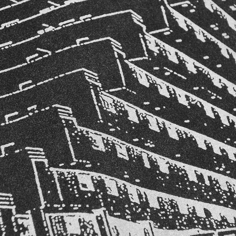 Molchat Doma Etazhi, member of the dark wave band, is a cotton washed long short sleeved T-shirt