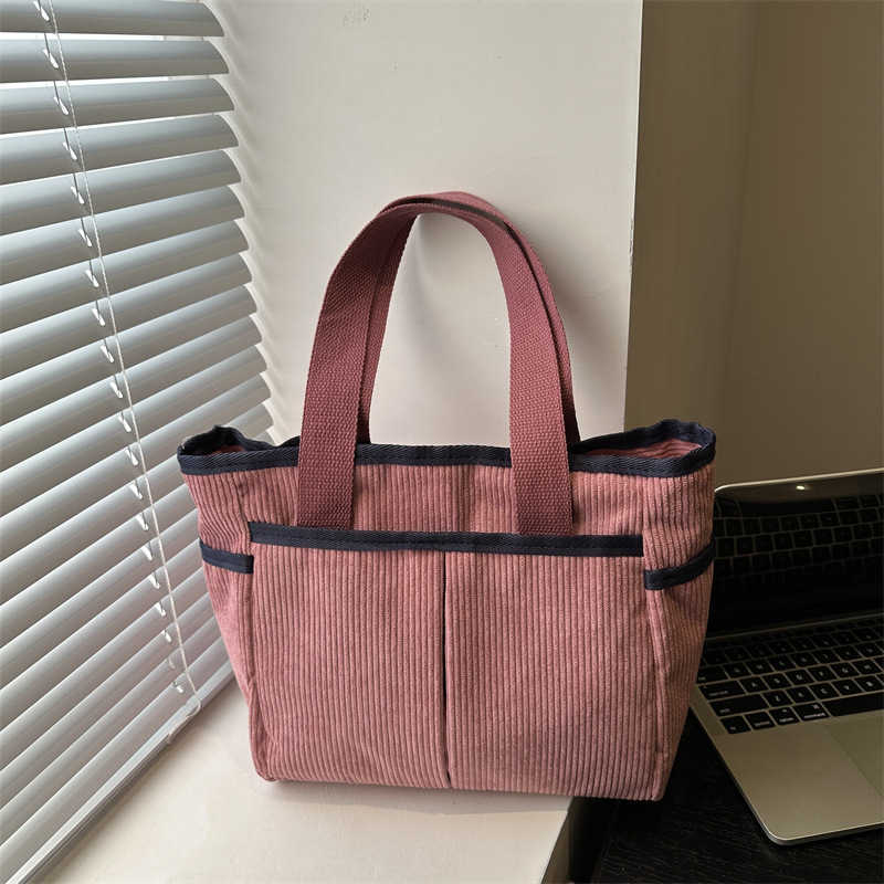 Corduroy solid color large capacity 2025 new early spring leisure trend flu personality commuting tote armpit shoulder bag 241231