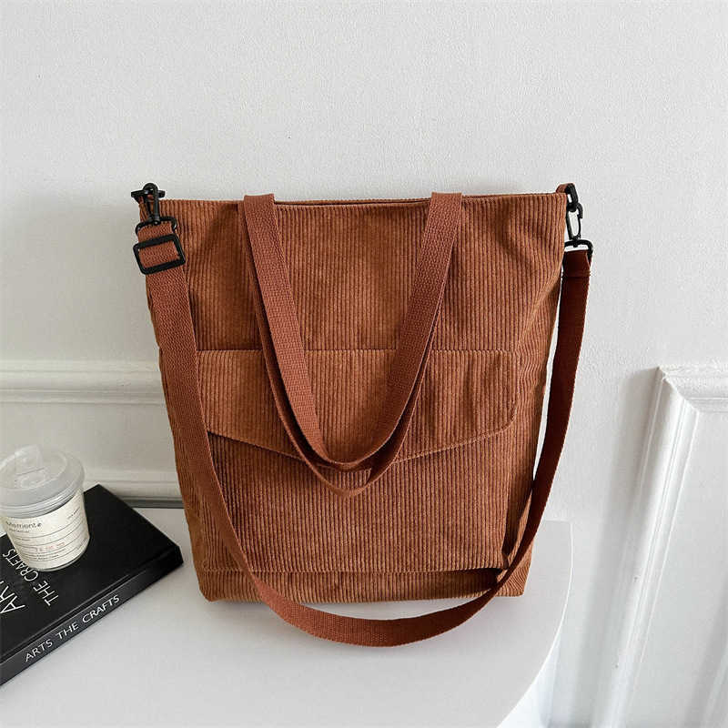 New Korean version of minimalist 2025 casual large capacity solid color fashionable striped fabric tote handbag, single shoulder crossbody women'