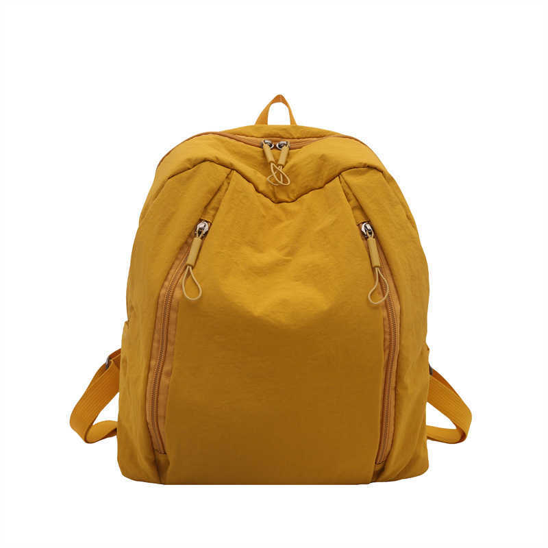 College style lightweight middle and high school students commuting to class trendy Western style solid color large capacity travel backpack for women