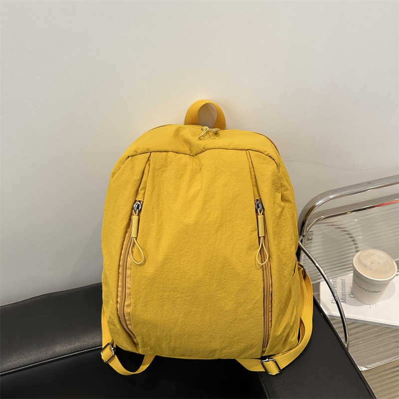 College style lightweight middle and high school students commuting to class trendy Western style solid color large capacity travel backpack for women
