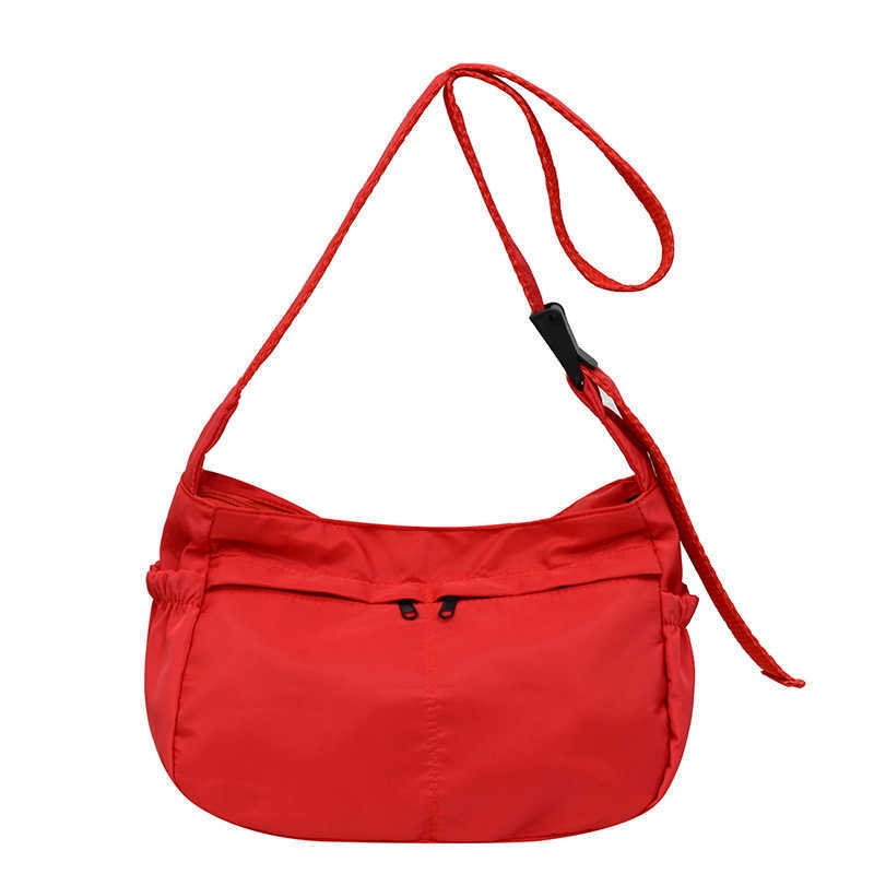 Large capacity single shoulder tote casual waterproof and stylish simple nylon fabric solid color lightweight sports dumpling tote women's bag 24