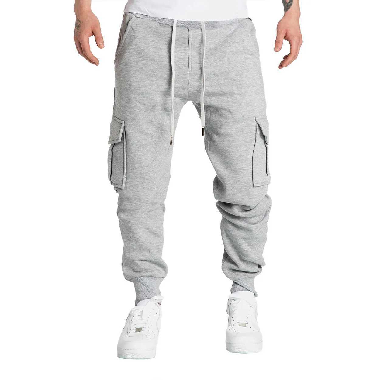 2024 mens sports pants suitable for straight runners in sports and streetwear loose oversized drawstring pants mens multi pocket pants W250318