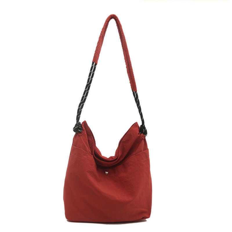 New solid color casual Korean trend 2024 stylish large capacity lightweight nylon cloth shoulder crossbody tote bag 241231