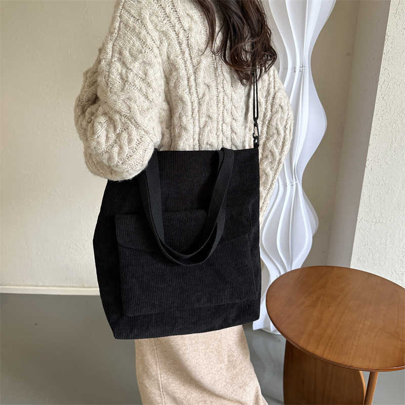 New Korean version of minimalist 2025 casual large capacity solid color fashionable striped fabric tote handbag, single shoulder crossbody women'