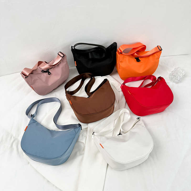 New large capacity simple and stylish 2024 nylon casual solid color contrasting dumpling tote single shoulder diagonal cross bag for women