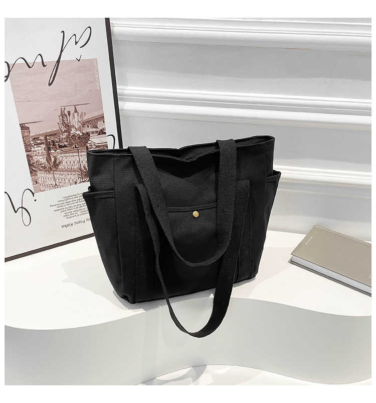 Large capacity canvas fashionable commuting to work and going out solid color leisure art tote, single shoulder armpit bag, women's bag