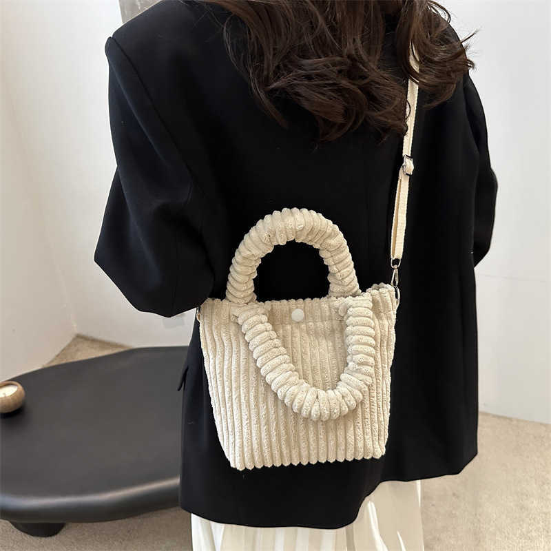 2024 contrasting new corduroy style, simple and large capacity casual single shoulder crossbody handbag, water bucket bag for women 241231