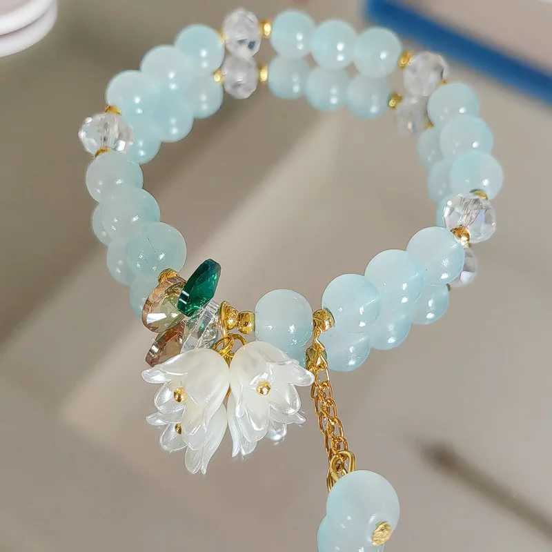 Cute green crystal bead bracelet suitable for womens Tren Lily Valley floral charm elastic adjustable bracelet wedding Birtay jewelry W241231