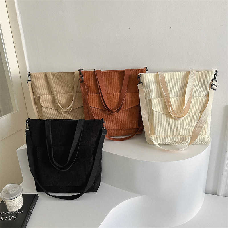 New Korean version of minimalist 2025 casual large capacity solid color fashionable striped fabric tote handbag, single shoulder crossbody women'