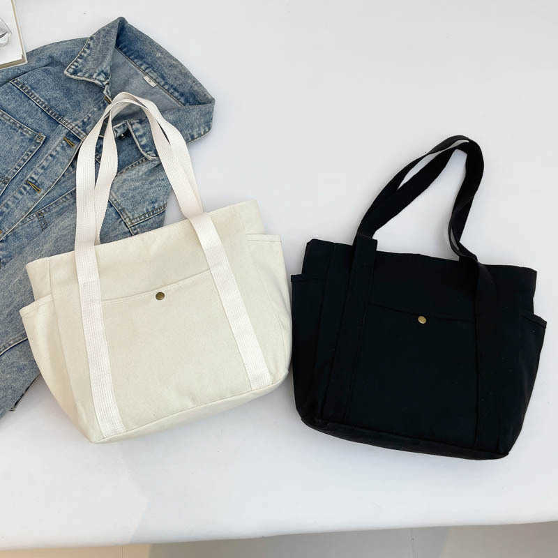 Large capacity canvas fashionable commuting to work and going out solid color leisure art tote, single shoulder armpit bag, women's bag